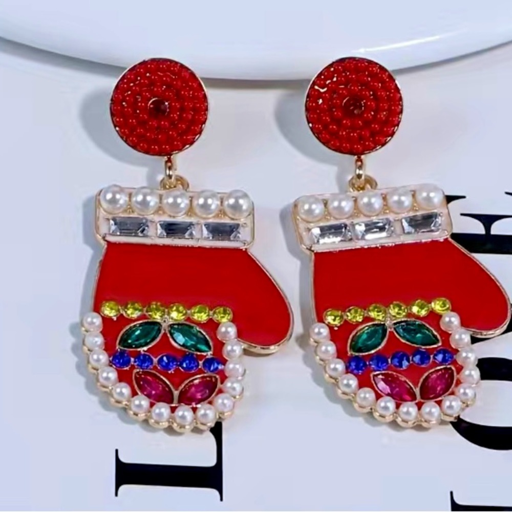Red Christmas mittens. Beaded and jewelled.